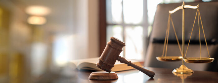 Scales of justice in court room